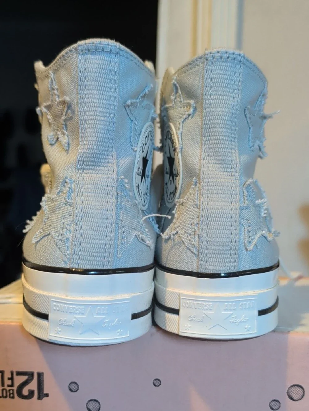 Converse Light Blue High-Top Sneakers with Star Stitching